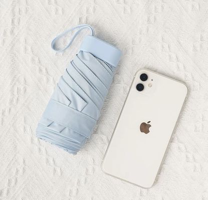 X503 카드 가방 우산 자외선 보호 및 햇볕이 잘 드는 날 간편하게 휴대 할 수있는 작은 주머니